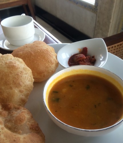 Poori or Puri  Unleavened Bread. As puffy as it gets! With potato masala.