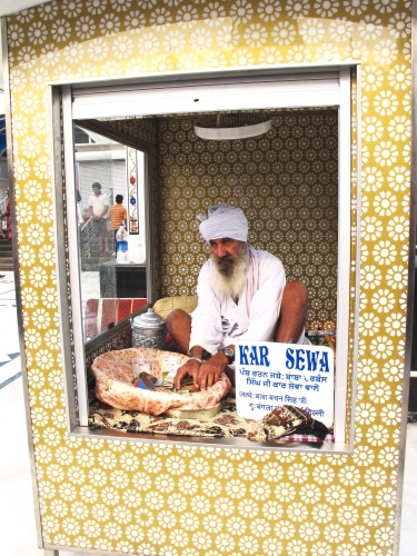 Sikh men wrap turbans around their uncut hair.