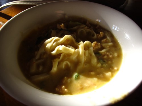 This is monhinga soup, made of rice noodles, fish broth and lotsa herbs and spices.